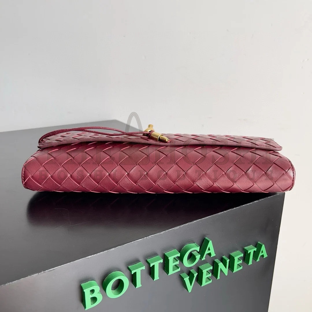 B0tt*ga Ven*ta Andiamo Clutch with Handle in Barolo Intrecciato Lambskin Master Quality